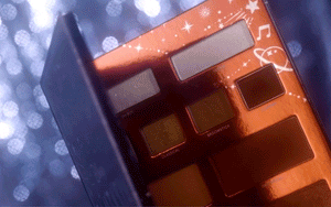 Gif of a makeup palette opening and closing